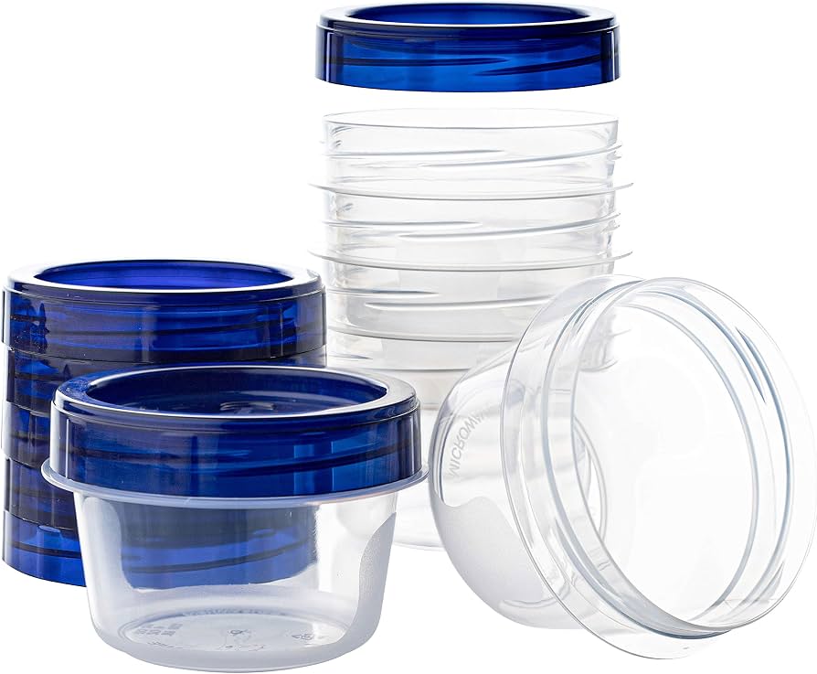 A stack of clear plastic freezer containers with matching lids on a kitchen counter, shown dry and ready to be labeled